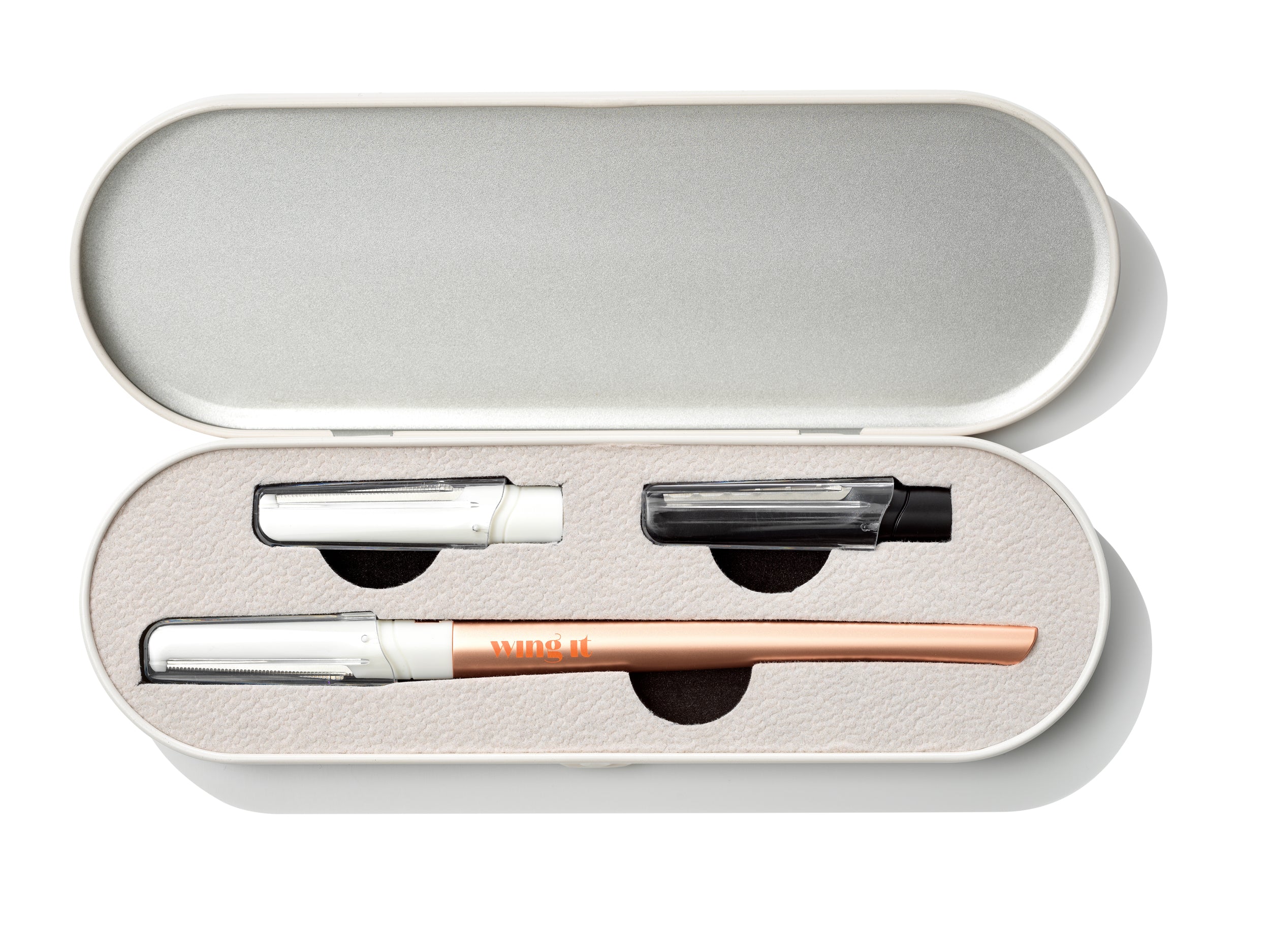 Wing It Forever Dermaplaning Razor with two extra blades in a tin