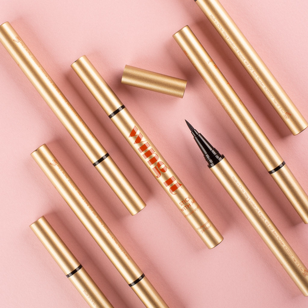 STICK WITH ME adhesive felt tip black eyeliner. Waterproof, 24 hour hold. Multiple gold tubes..