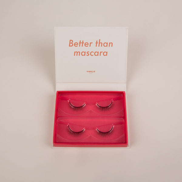 Double pack of SILK SYSTEM luxury false eyelashes in white and pink packaging.