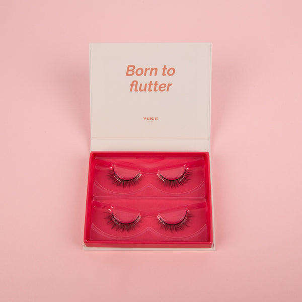 Double pack of SILK SYSTEM vegan luxury false eyelashes in cream and pink packaging.