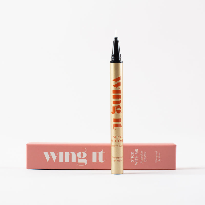 STICK WITH ME adhesive felt tip brown eyeliner. Gold tube, terracotta wing it cosmetics packaging.